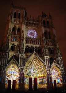 Amiens Cathedral. Modern technology recreating the medieval polychromy on the exterior of the Cathedral.